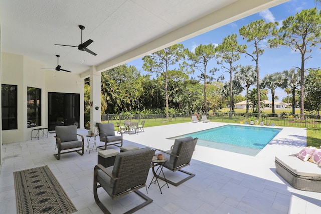 view of pool featuring a patio, an outdoor hangout area, and ceiling fan