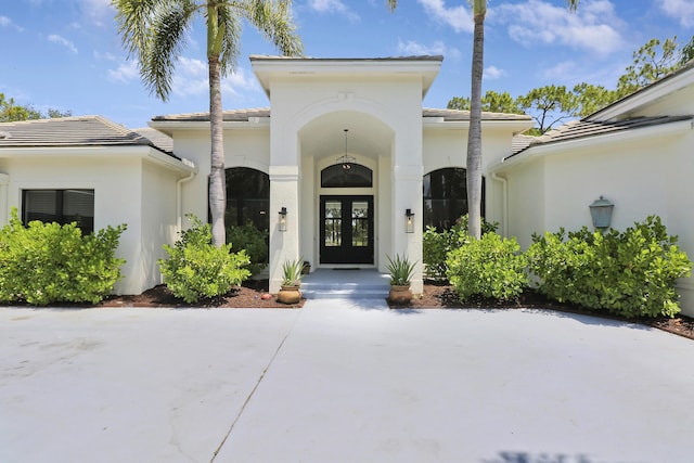 doorway to property featuring french doors