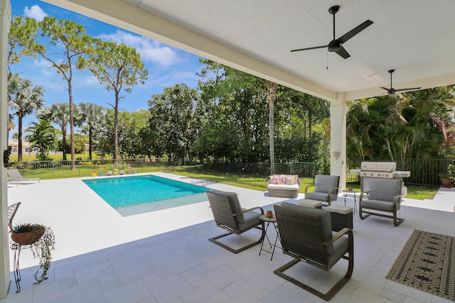 view of pool featuring grilling area, outdoor lounge area, ceiling fan, and a patio area