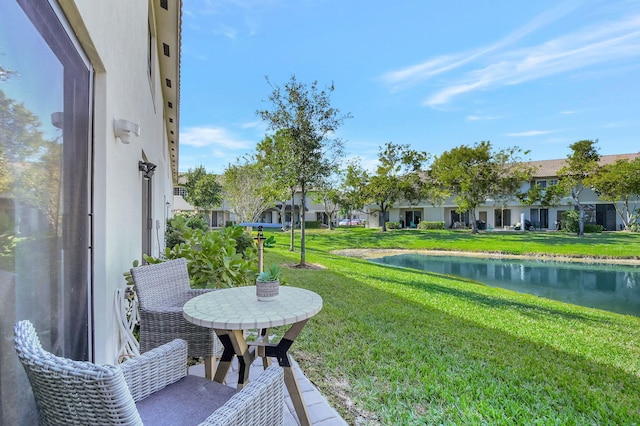 view of yard with a water view