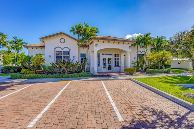 mediterranean / spanish house with french doors