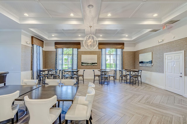 dining space with light parquet floors, a wealth of natural light, crown molding, and coffered ceiling