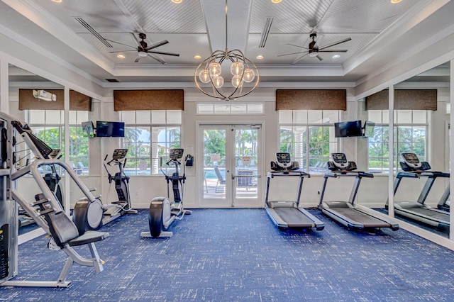 workout area featuring french doors, ceiling fan with notable chandelier, and ornamental molding