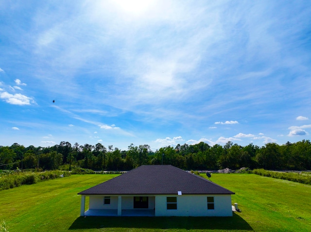 exterior space featuring a yard and a patio