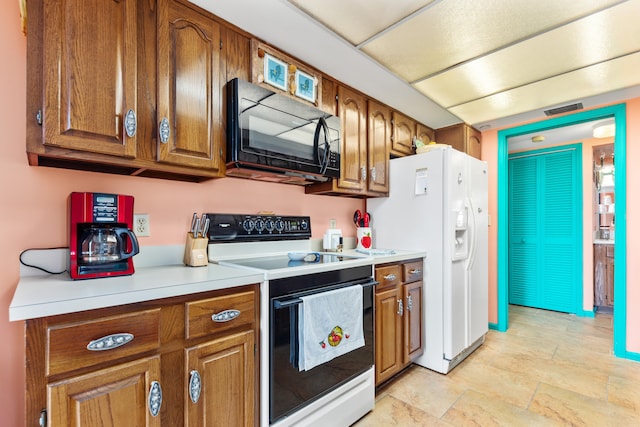 kitchen featuring white appliances