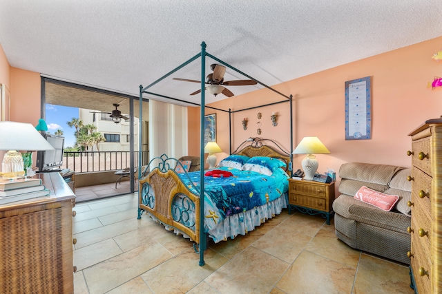 bedroom with ceiling fan, a textured ceiling, and a wall of windows