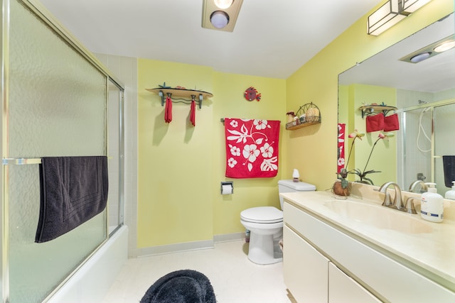 full bathroom with tile patterned floors, vanity, toilet, and enclosed tub / shower combo