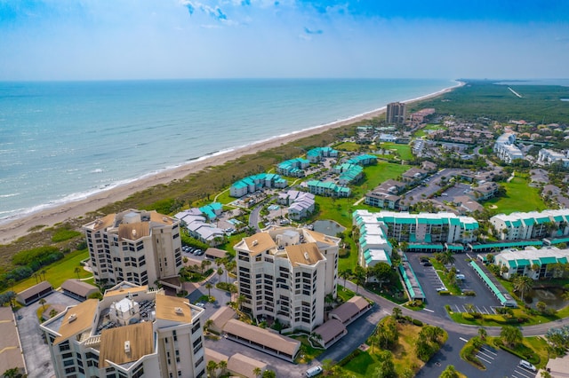 aerial view featuring a beach view and a water view