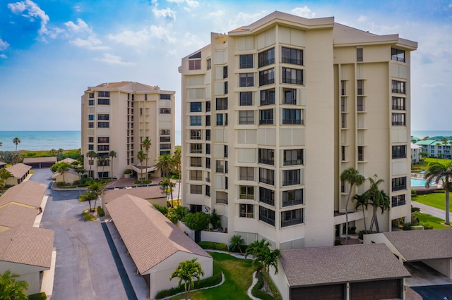 view of building exterior with a water view