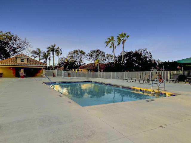 view of pool featuring a patio