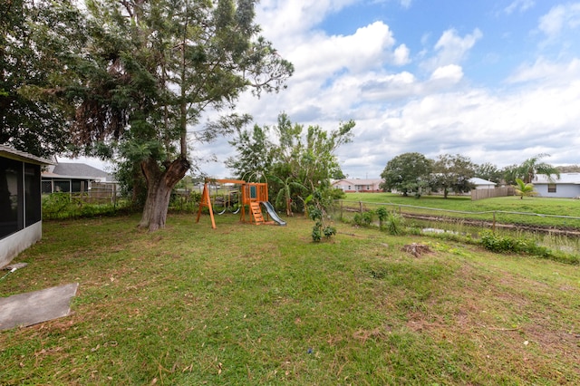 view of yard with a playground