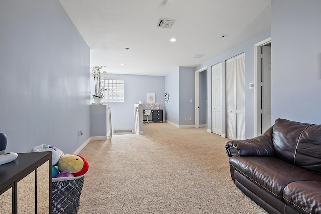 living room with light colored carpet