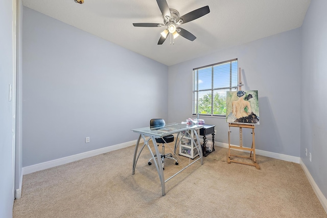 carpeted office with ceiling fan