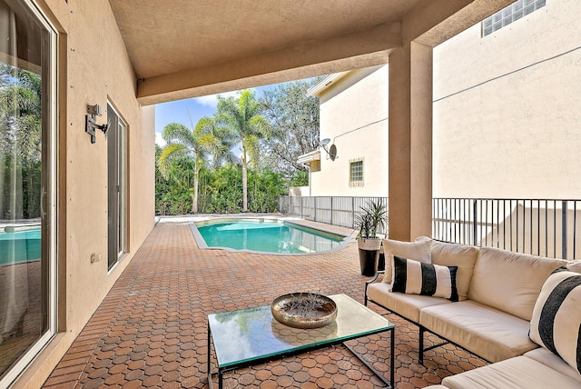 view of swimming pool featuring an outdoor hangout area and a patio