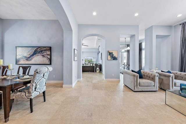 interior space featuring ceiling fan