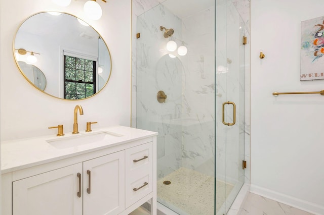 bathroom featuring vanity and a shower with door