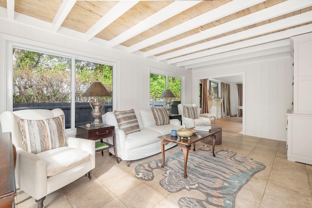 sunroom featuring beamed ceiling and wood ceiling