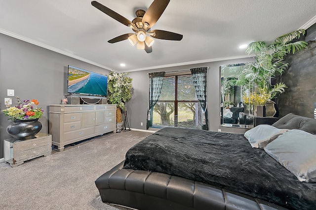 carpeted bedroom with ceiling fan, ornamental molding, and a textured ceiling