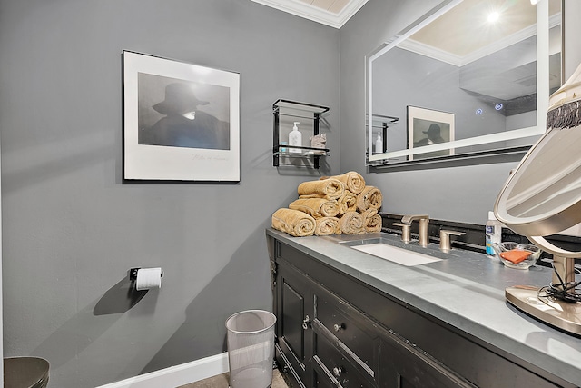 bathroom with vanity and crown molding