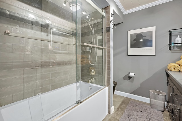 bathroom featuring tile patterned floors, vanity, combined bath / shower with glass door, and ornamental molding