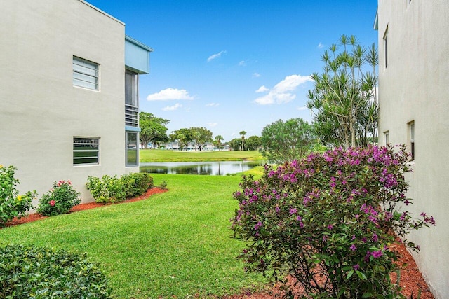 view of yard with a water view