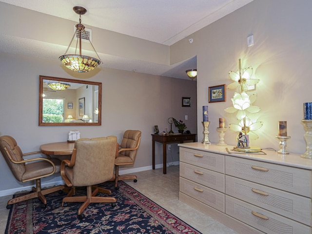 dining space with visible vents, baseboards, and light tile patterned flooring