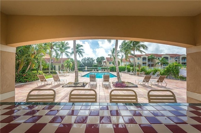 view of patio with a community pool