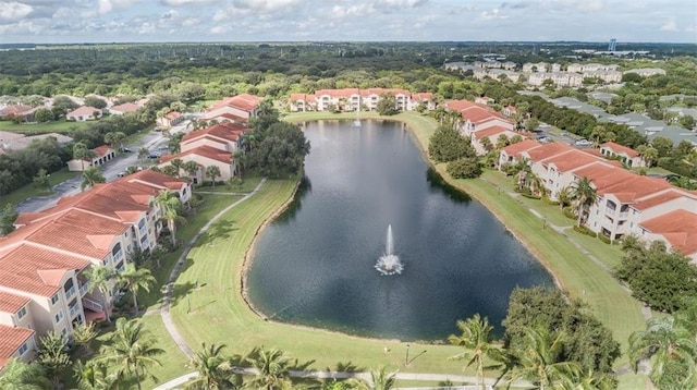 bird's eye view featuring a residential view and a water view