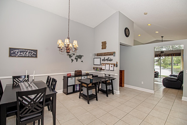 dining area featuring light tile patterned flooring, high vaulted ceiling, and a chandelier