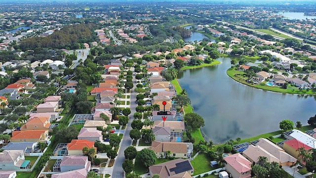 drone / aerial view featuring a water view