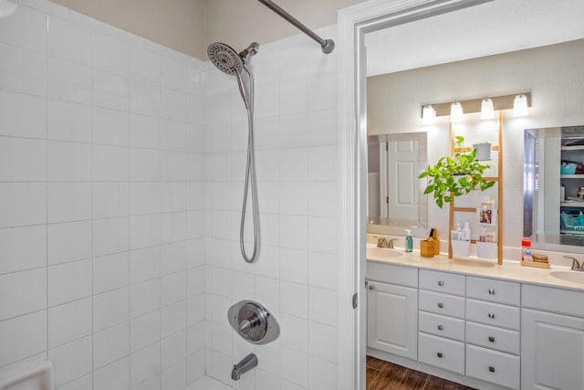 bathroom with hardwood / wood-style flooring and vanity