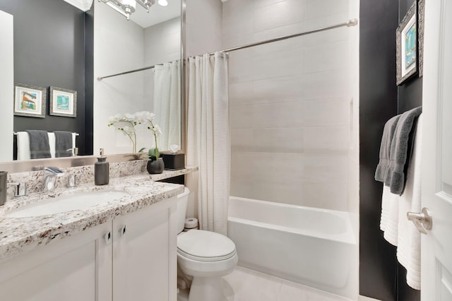 full bathroom with tile patterned flooring, vanity, toilet, and shower / bath combo