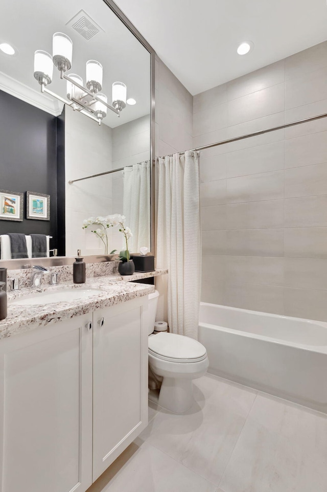 full bathroom featuring vanity, toilet, and shower / bath combo with shower curtain