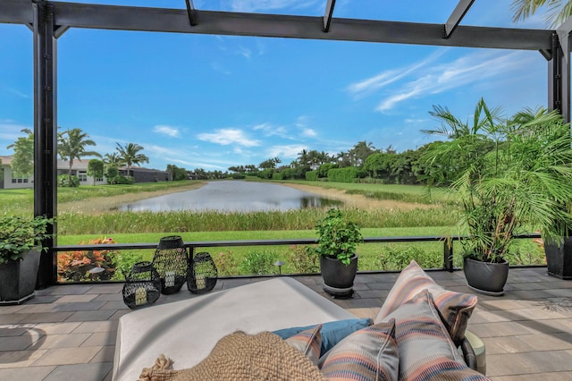 view of patio featuring a water view