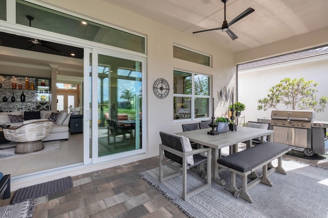 view of patio / terrace with area for grilling and ceiling fan