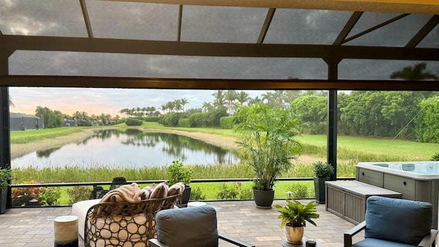 sunroom with a water view