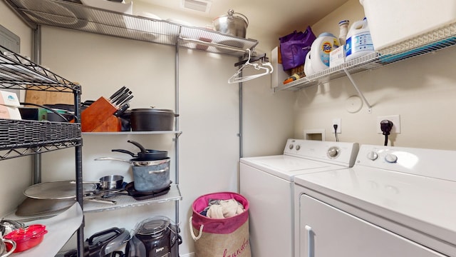 laundry room featuring separate washer and dryer