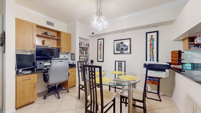 tiled home office featuring a notable chandelier, built in desk, and ornamental molding