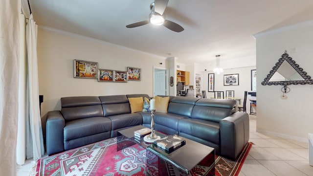 living room with light tile patterned floors, ceiling fan, and ornamental molding