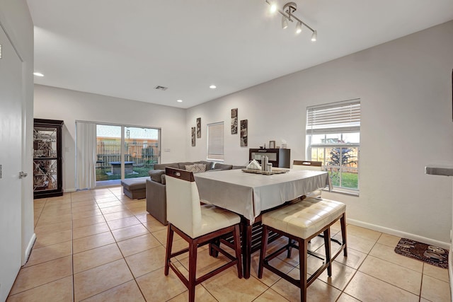 dining area featuring light tile patterned flooring, visible vents, recessed lighting, and baseboards