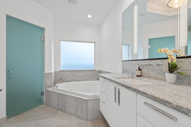 bathroom with tile patterned flooring, vanity, and separate shower and tub