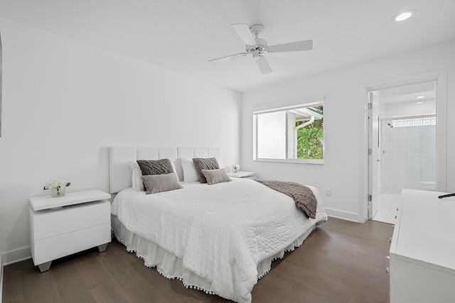 bedroom featuring ceiling fan, dark hardwood / wood-style flooring, and ensuite bathroom