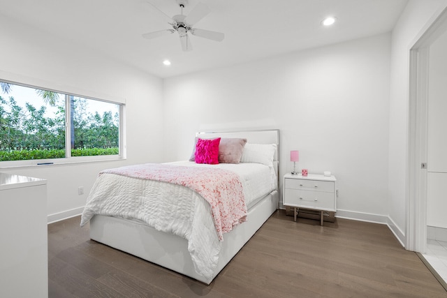 bedroom featuring wood-type flooring and ceiling fan