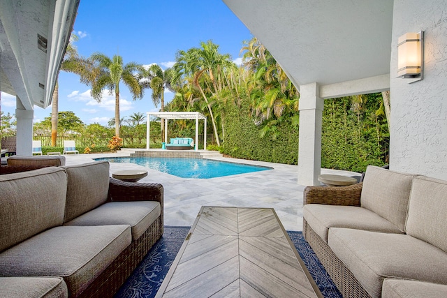 view of pool with an outdoor hangout area, a pergola, and a patio