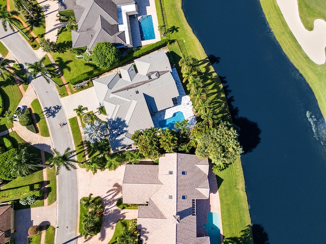 birds eye view of property featuring a water view