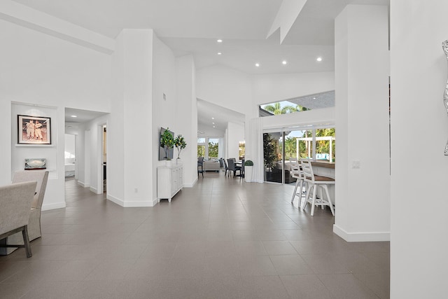 interior space with high vaulted ceiling