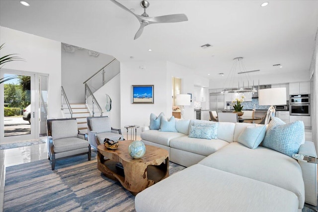 living room featuring ceiling fan