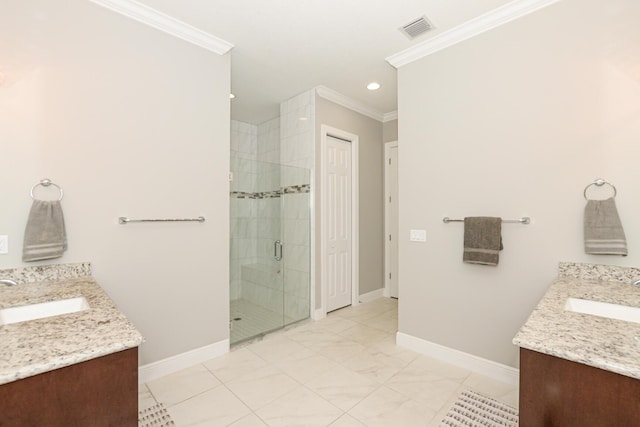 bathroom featuring vanity, a shower with shower door, and crown molding