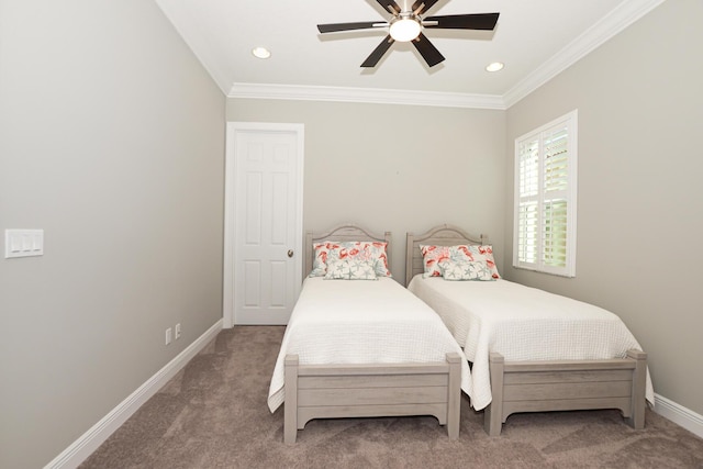 bedroom featuring ceiling fan, carpet floors, and ornamental molding