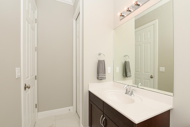 bathroom featuring vanity and crown molding